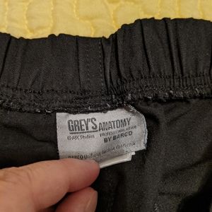 Black bootcut scrub pants